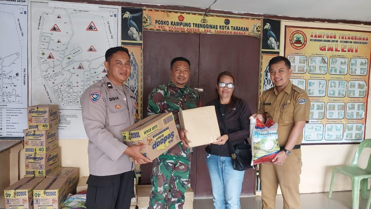 Bantu Sesama,Babinsa Koramil 0907/03 Tarbar Salurkan Parcel Natal Untuk Warga Kurang Mampu