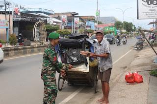 Kodim 1022/Tanah Bumbu Berbagi Kebahagian Kepada Sesama