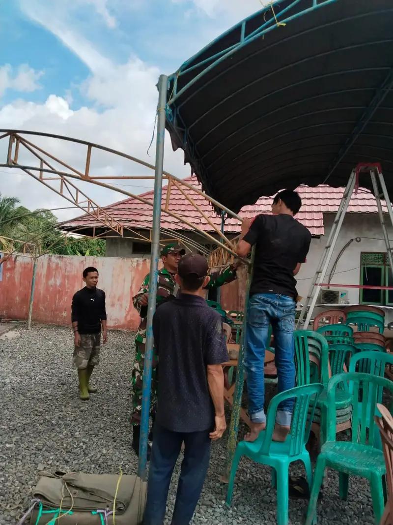 Kolaborasi Masyarakat dan Babinsa Koramil 1010-07/Piani Dirikan Pos Rest Area Jemaah Haul Guru Sekumpul