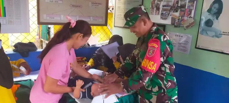 Babinsa Girimukti Dampingi Posyandu Balita Di Wilayah Binaan