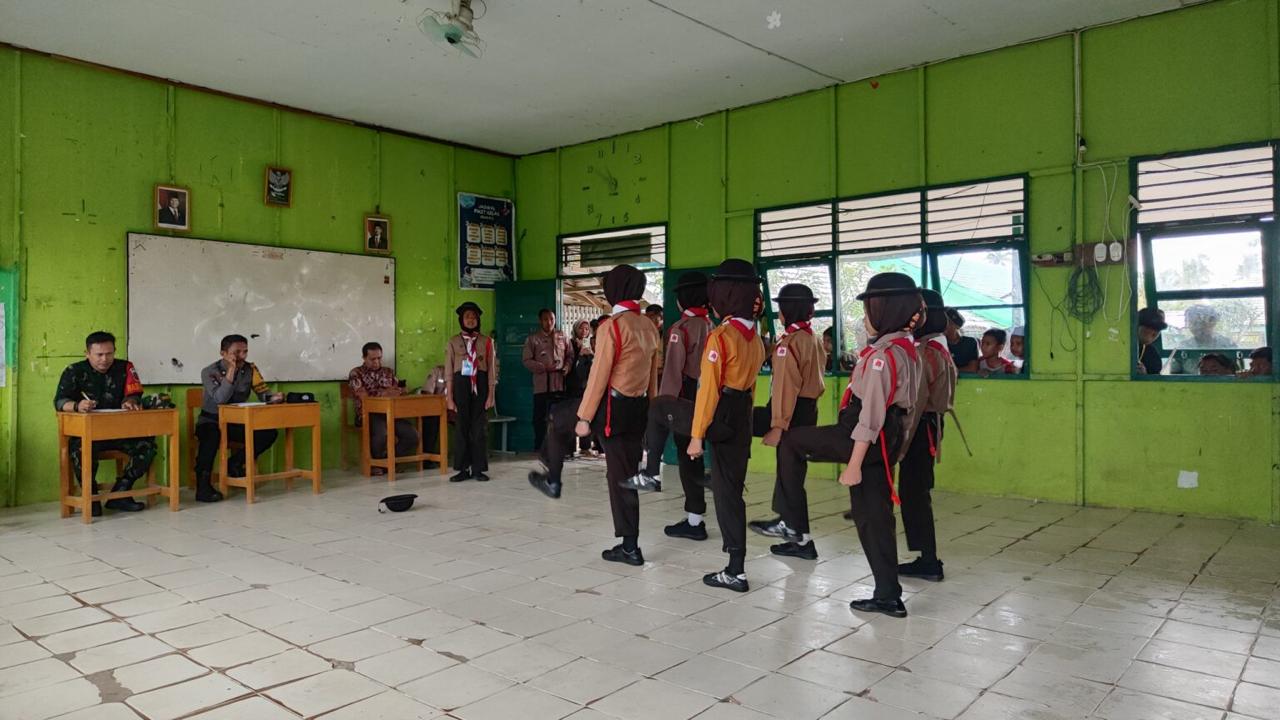 Babinsa Koramil 11/Aluh-Aluh Menjadi Juri Lomba PBB Pada Kemah Bakti Pramuka