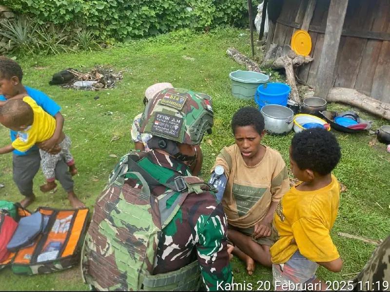 Satgas Yonif 614/RJP Pos Kanggime Berikan Pelayanan Kesehatan Gratis dan Sembako kepada Masyarakat Perbatasan