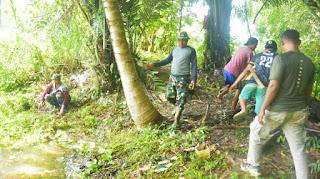 Gotong Royong Pembersihan Embung Saat TMMD Ke-123 di Talusi